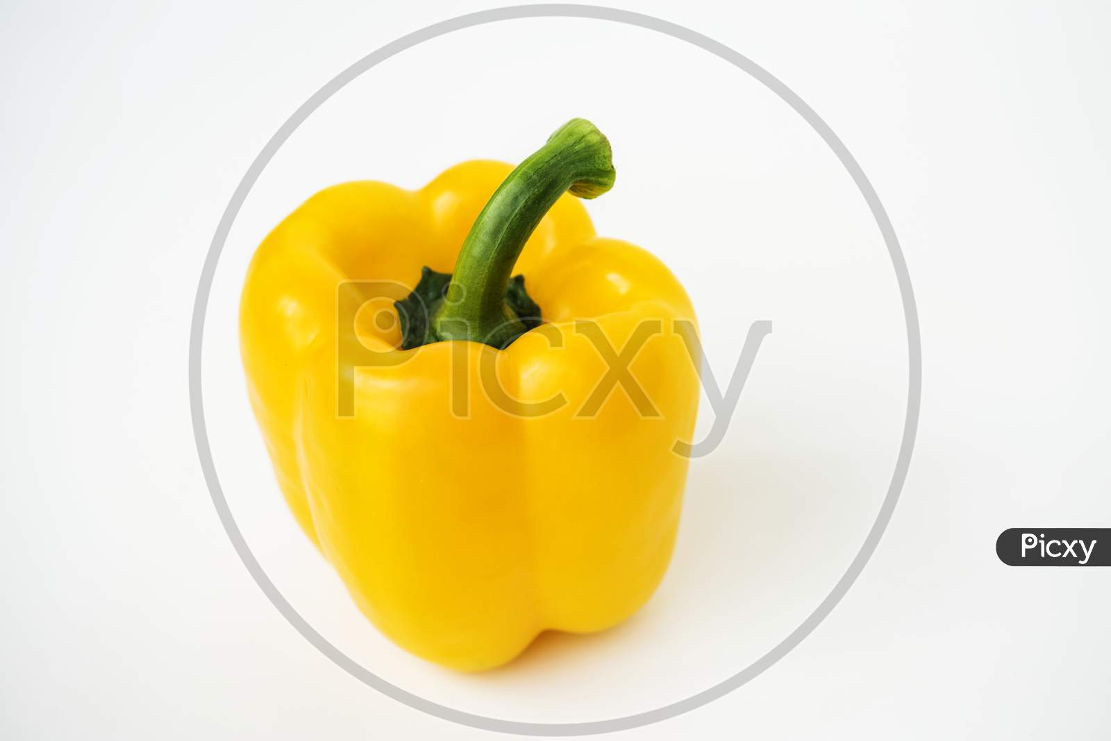 Macro Shot Of Sweet Bell Pepper Isolated On White Background