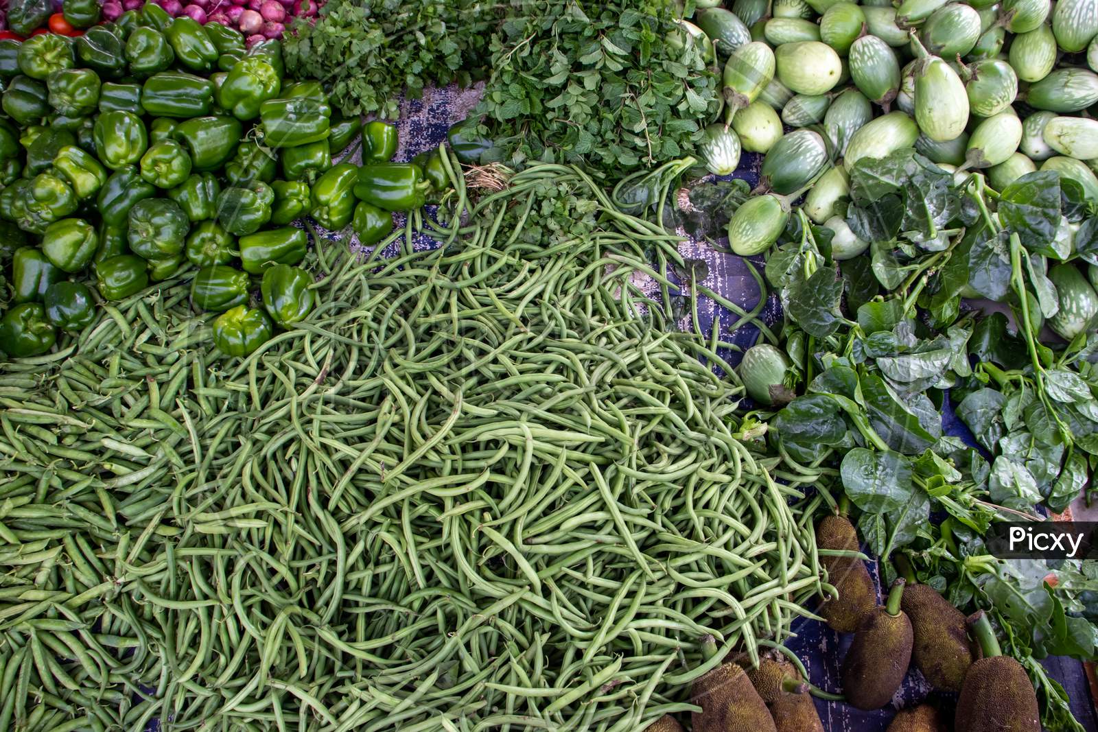Various Raw Vegetables In An Indian Vegetable Market For Selling