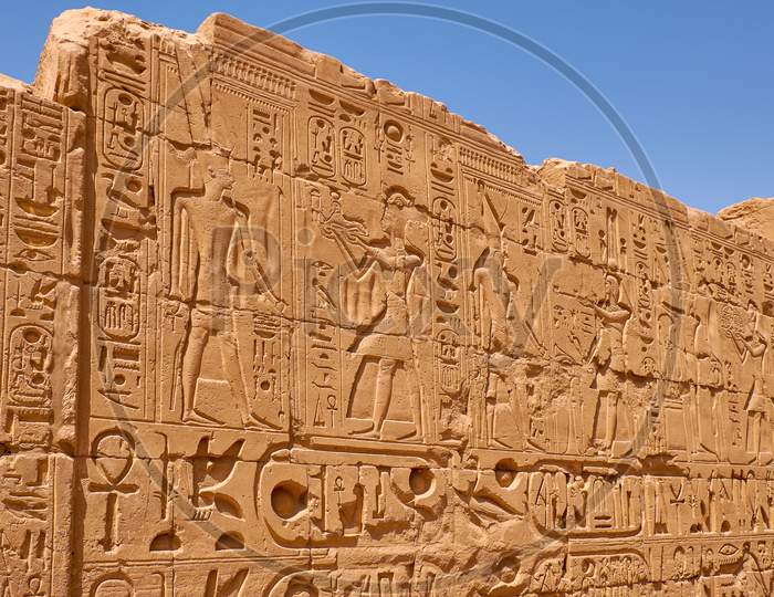 Relief Details And Egyptian Hieroglyphs At Karnak Temple In Luxor, Egypt