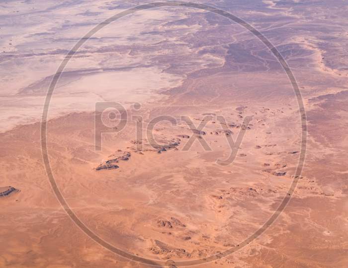 Aerial Airplane View Of Barren Sahara Desert Landscape In Egypt