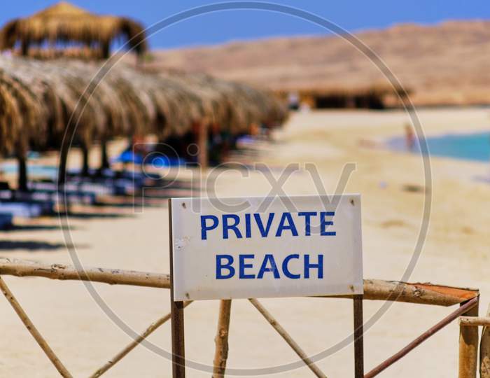 Private Beach Sign On A Beautiful White Sandy Beach On Giftun Island (Paradise Island) In Red Sea, Hurghada, Egypt