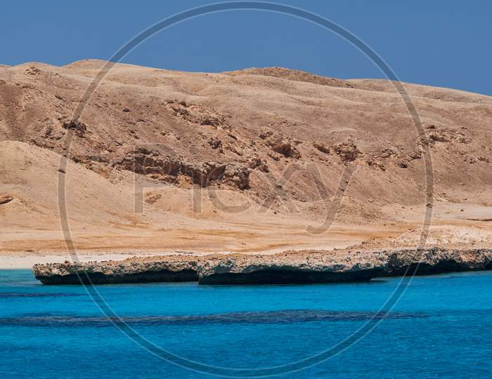 Sandy Beach And Clear Blue Waters Rich In Coral Reefs Of Giftun Island Near Hurghada, Red Sea Coast, Egypt