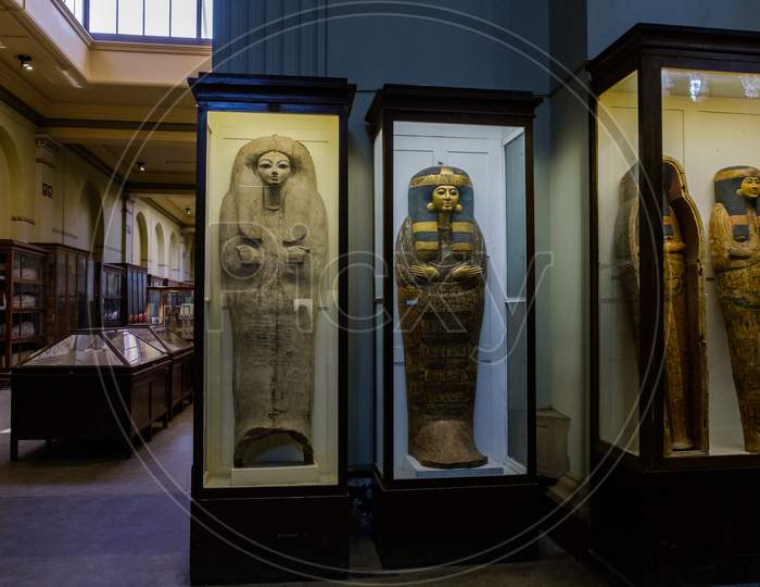 Ancient Egyptian Sarcophagi And Mummy Caskets Displayed In Egyptian Museum In Cairo, Capital Of Egypt
