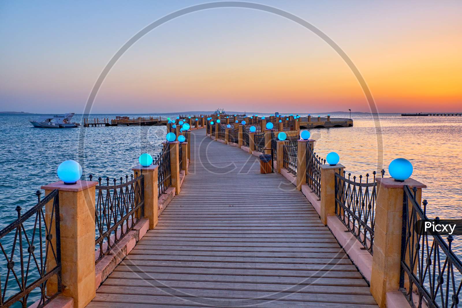 View Of The Promenade Boardwalk Over The Red Sea During Sunrise In Hurghada, Egypt