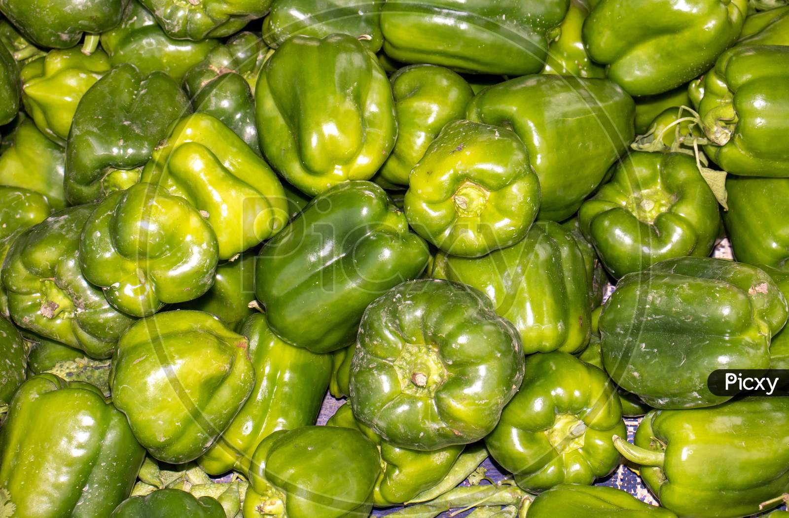 Capsicum Or Bell Pepper In An Indian Vegetable Market For Selling, Perfect For Background And Wallpaper
