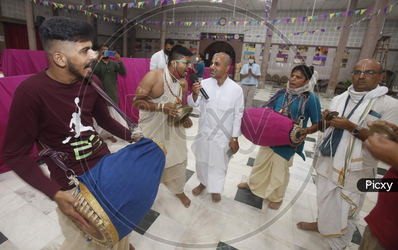 Devotees sing devotional songs  during Janmashtami celebrations at ISKCON (The International Society for Krishna Consciousness) temple in Chandigarh August 12, 2020