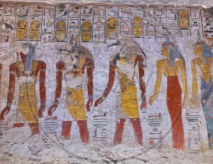 Ancient Paintings And Egyptian Hieroglyphs At The Pharaoh Tomb In The Valley Of The Kings In Luxor, Egypt