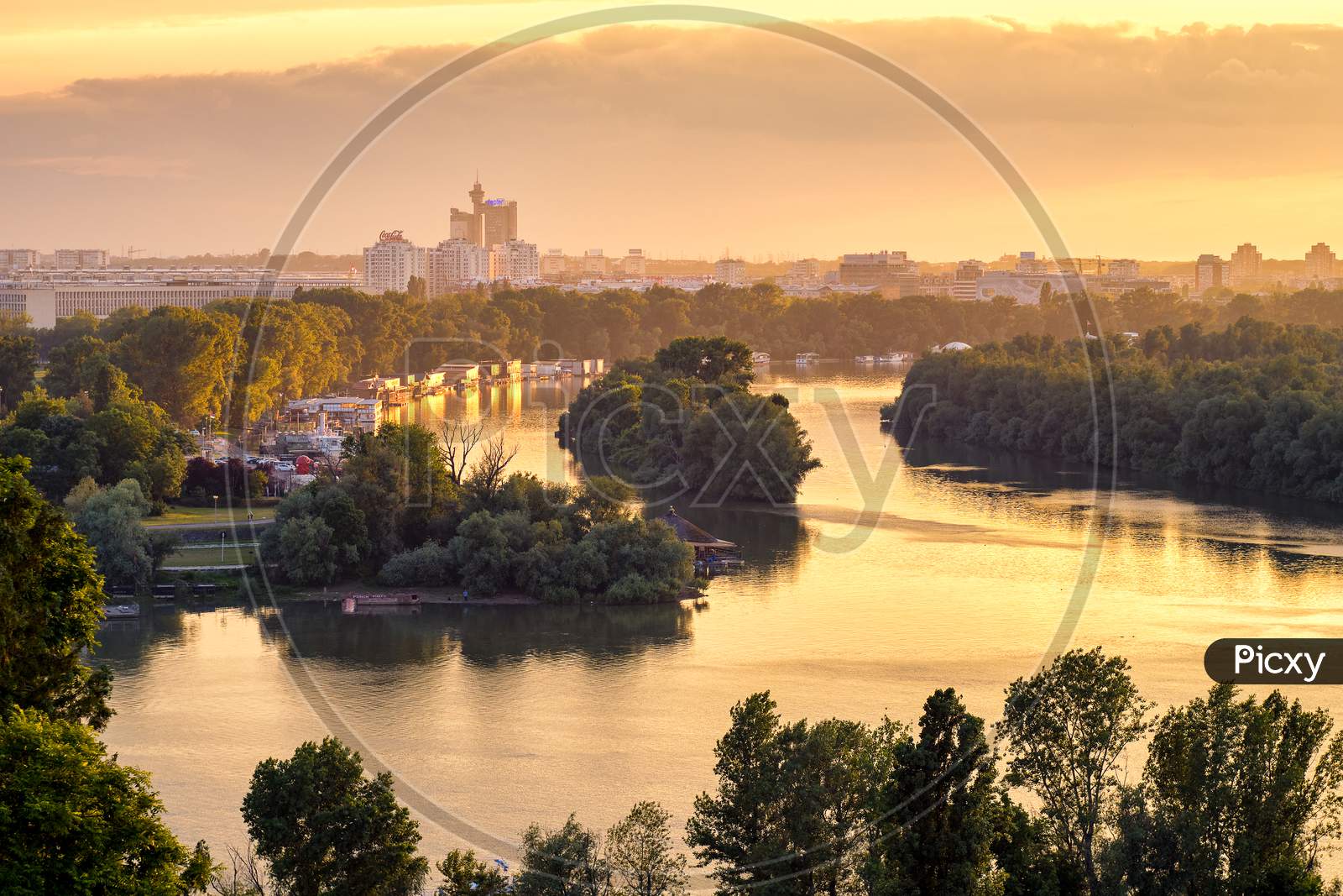 Belgrade Cityscape And Confluence Of Rivers Danube And Sava At Golden Hour