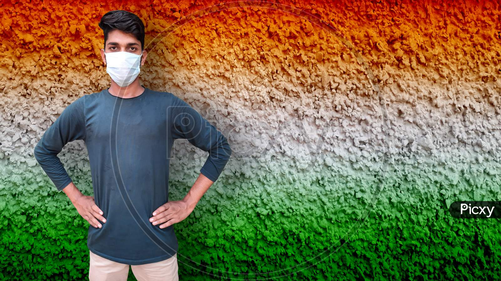 Young Male Model Wearing Face Mask For Corona Virus Independence Day Concept