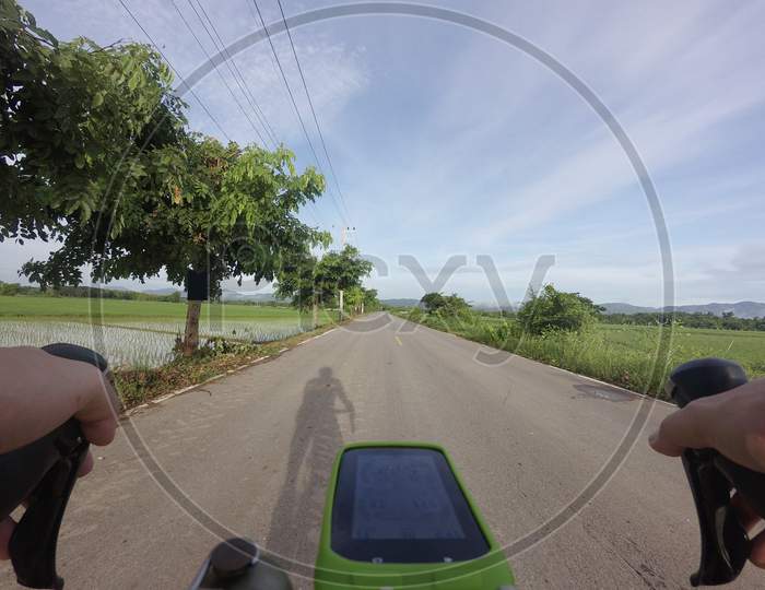 Bicycle Cycling Along The Road, First Person Biker Eyes View