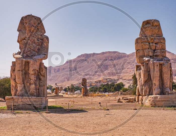 Colossi Of Memnon, Massive Stone Statues Of The Pharaoh Amenhotep Iii In Luxor, Egypt.