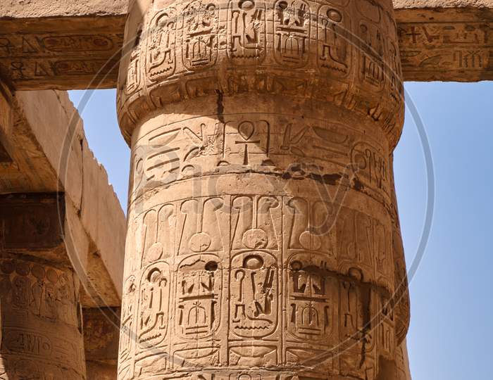 Massive Pillars Of The Great Hypostyle Hall In The Karnak Temple In Luxor, Egypt