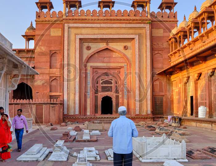 Man Praying In Jama Masjid Mosque In Fatehpur Sikri In Agra, India