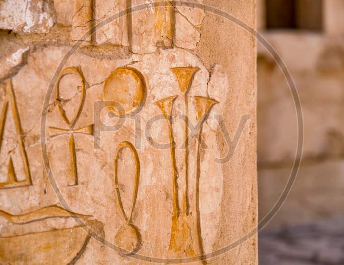 Egyptian Hieroglyphs At The Mortuary Temple Of Hatshepsut In Luxor, Egypt