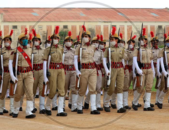 Indian police personnel wearing face masks take part in a final rehearsal for the upcoming ceremony to celebrate India's Independence Day In Ajmer, On August 13, 2020.