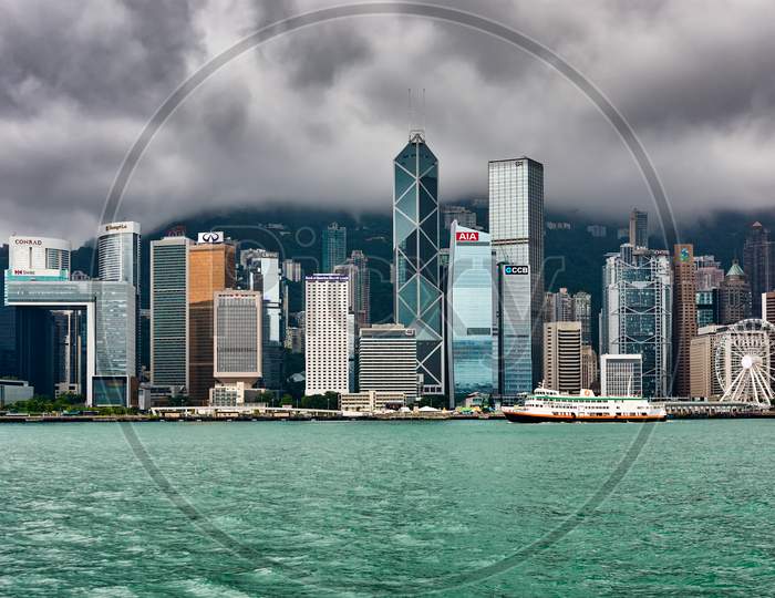 Hong Kong City Skyline On A Stormy Day, View From Across Victoria Harbor