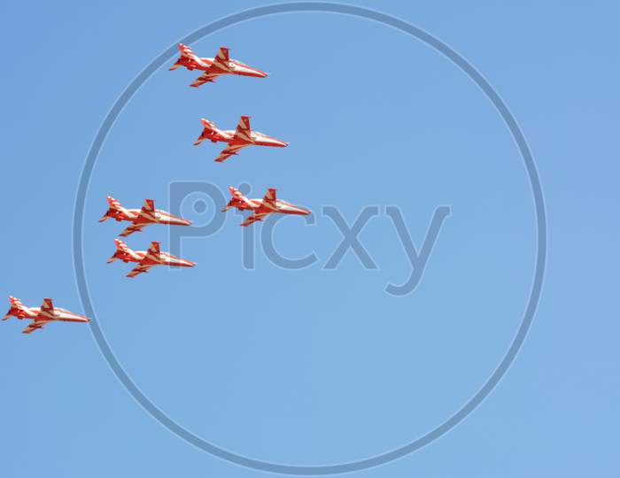 Surya Kiran, an Aerobatics demonstration aircraft of the Indian Air Force forming pattern in air