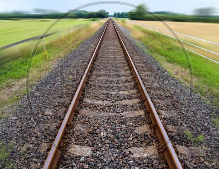 Diminishing Perspective View At A Railroad Track With A High Speed Motion Blur