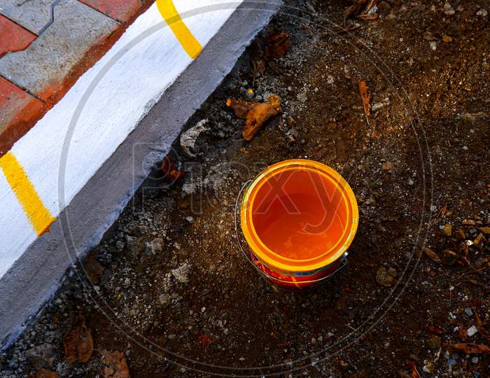 Top View Of Yellow Color Paint Can Isolated On Ground