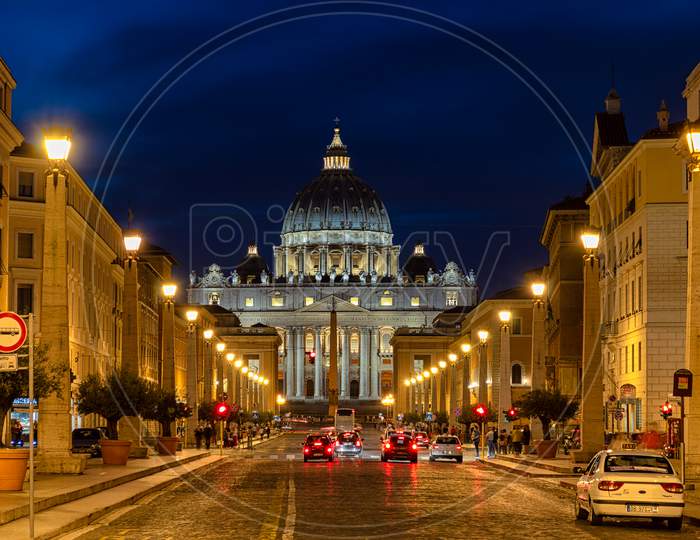 Illuminated Dome Of The St. Peter'S Basilica In Vatican City, Rome, Italy