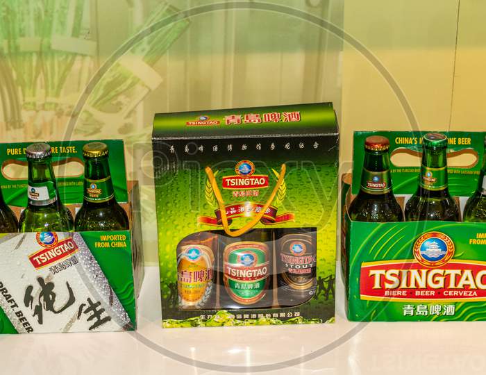 Different Packaging Of Tsingtao Beer Exhibited At Qingdao Beer Museum And Tsingtao Beer Brewery In Qingdao, China