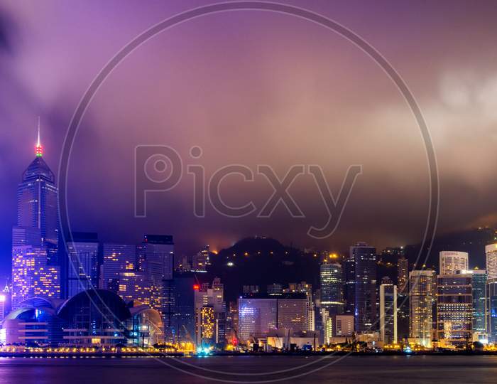 Night View Of Hong Kong Skyline Across Victoria Bay