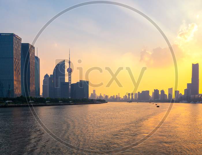 Iconic Lujiazui Skyline Of Shanghai And The Huangpu River At Sunset