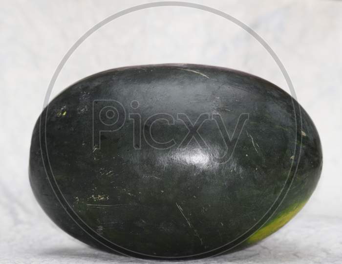 Watermelon Fruit From Asia India. Fresh Indian Fruit Water Melon Also Known As Tarbuz In India, Pakistan, Nepal Isolated Single Piece On White Background