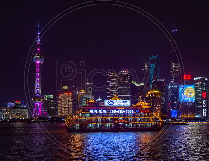 Night View Of Oriental Pearl Tower And Pudong New Area In Shanghai Across Huangpu River
