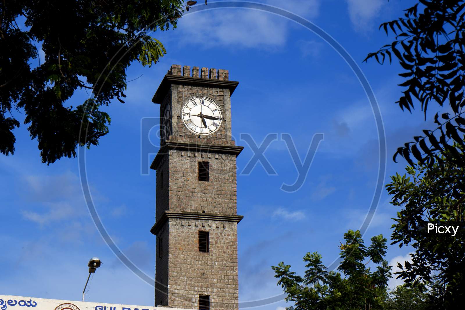 Close Shot Of Library Clock Tower Building Isolated In Gulbarga University Campus Kalaburagi