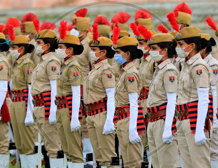 Indian police personnel wearing face masks take part in a final rehearsal for the upcoming ceremony to celebrate India's Independence Day In Ajmer, On August 13, 2020.