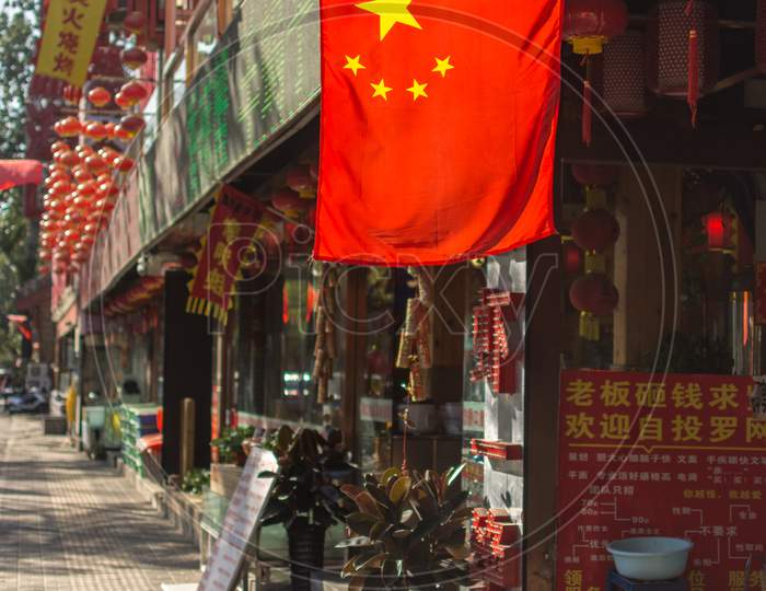 National Flag Of China In The Street In Beijing For National Day Of China