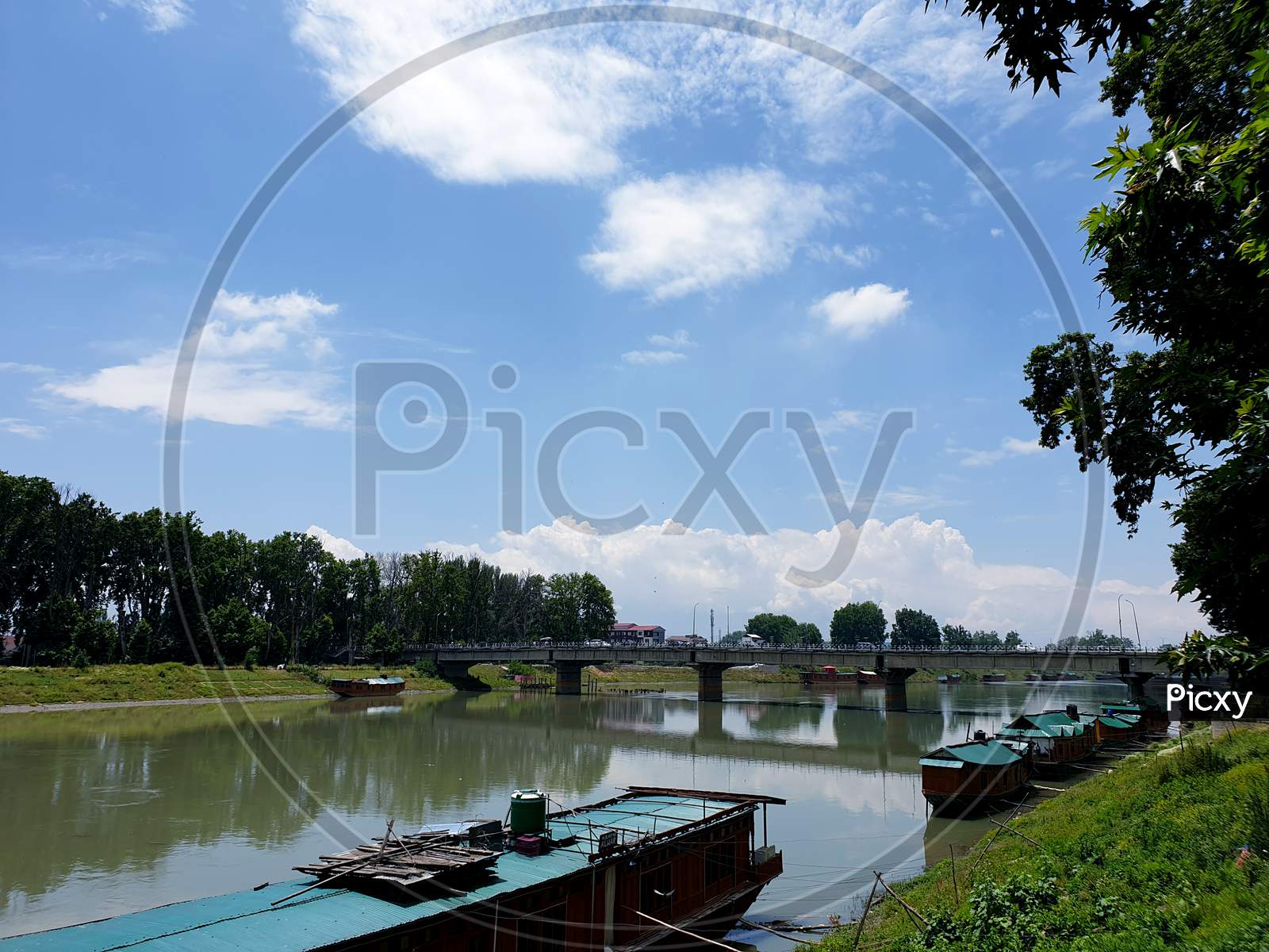 Image of Wood Works On River, Brown Colour Wood Carving. Wooden Art Is