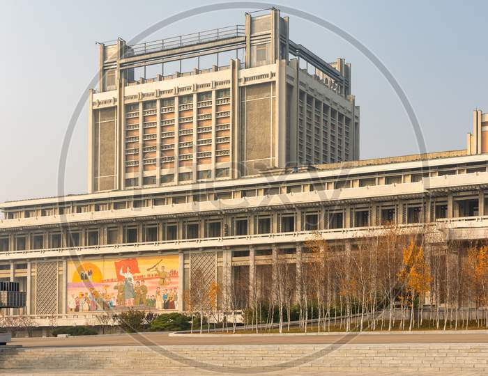 Building Decorated With Revolutionary Symbols And Slogans In Pyongyang, North Korea