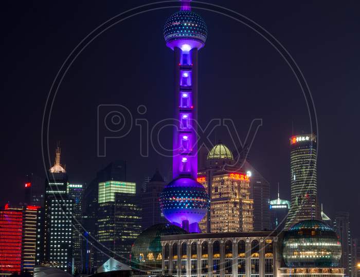 Night View Of Oriental Pearl Tower In Pudong New Area In Shanghai Across Huangpu River