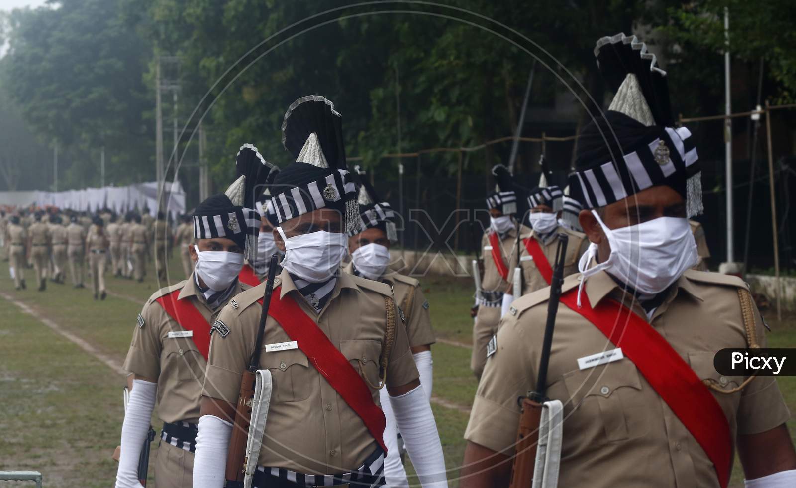 Policemen leave the parade ground after full dress rehearsal ahead of India's 74th  Independence day in Chandigarh August 13, 2020