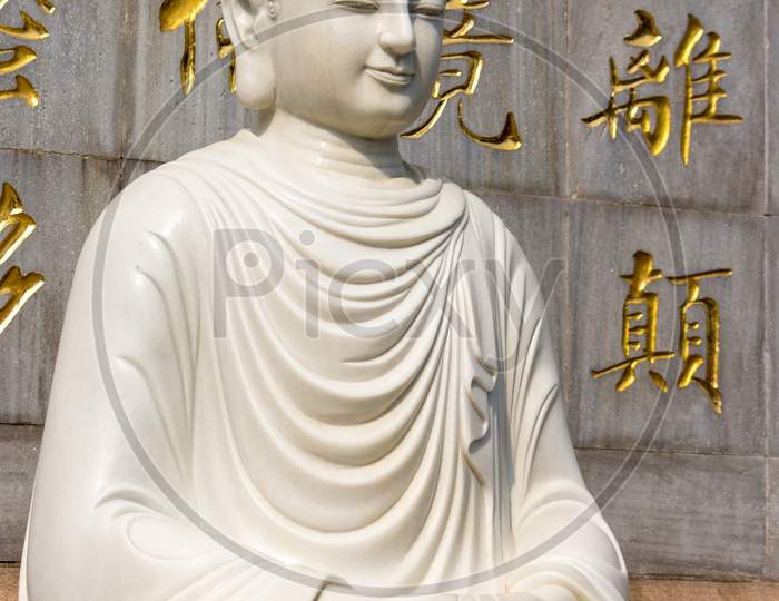 Statue Of Sakyamuni Buddha At The Eight Great Temples In Beijing, China