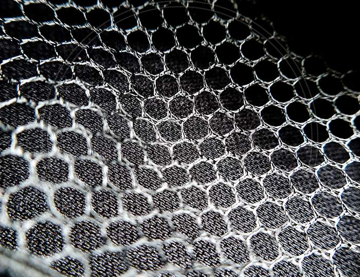 Net of a cover box with hexagonal shapes giving structure and texture to the image.