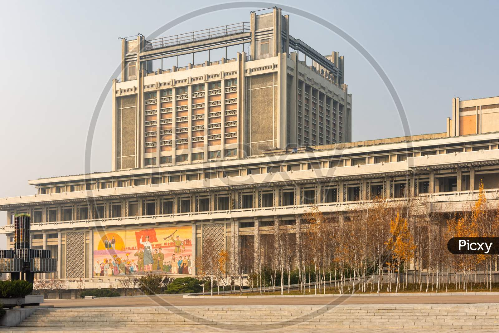 Building Decorated With Revolutionary Symbols And Slogans In Pyongyang, North Korea