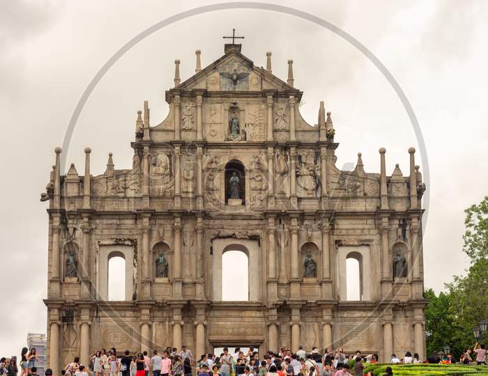 Tourist Visit The Ruins Of St. Paul Catholic Church In Macau, China