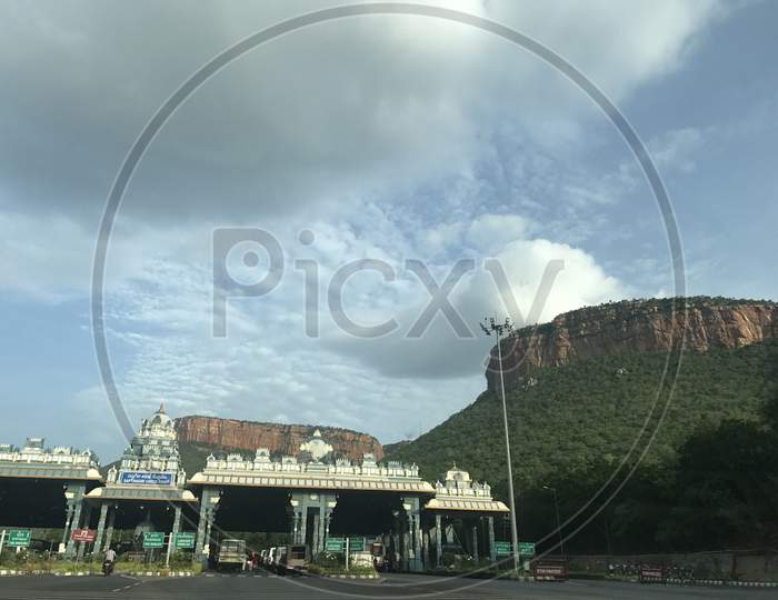 Beautiful sky behind the hills with clouds and Hindu Arch