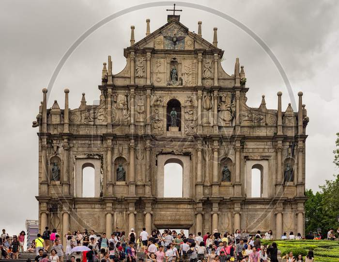 Tourist Visit The Ruins Of St. Paul Catholic Church In Macau, China