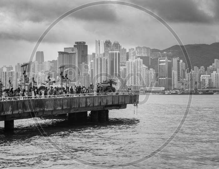 People View The Iconic Hong Kong City Skyline From Tsim Sha Tsui Promenade
