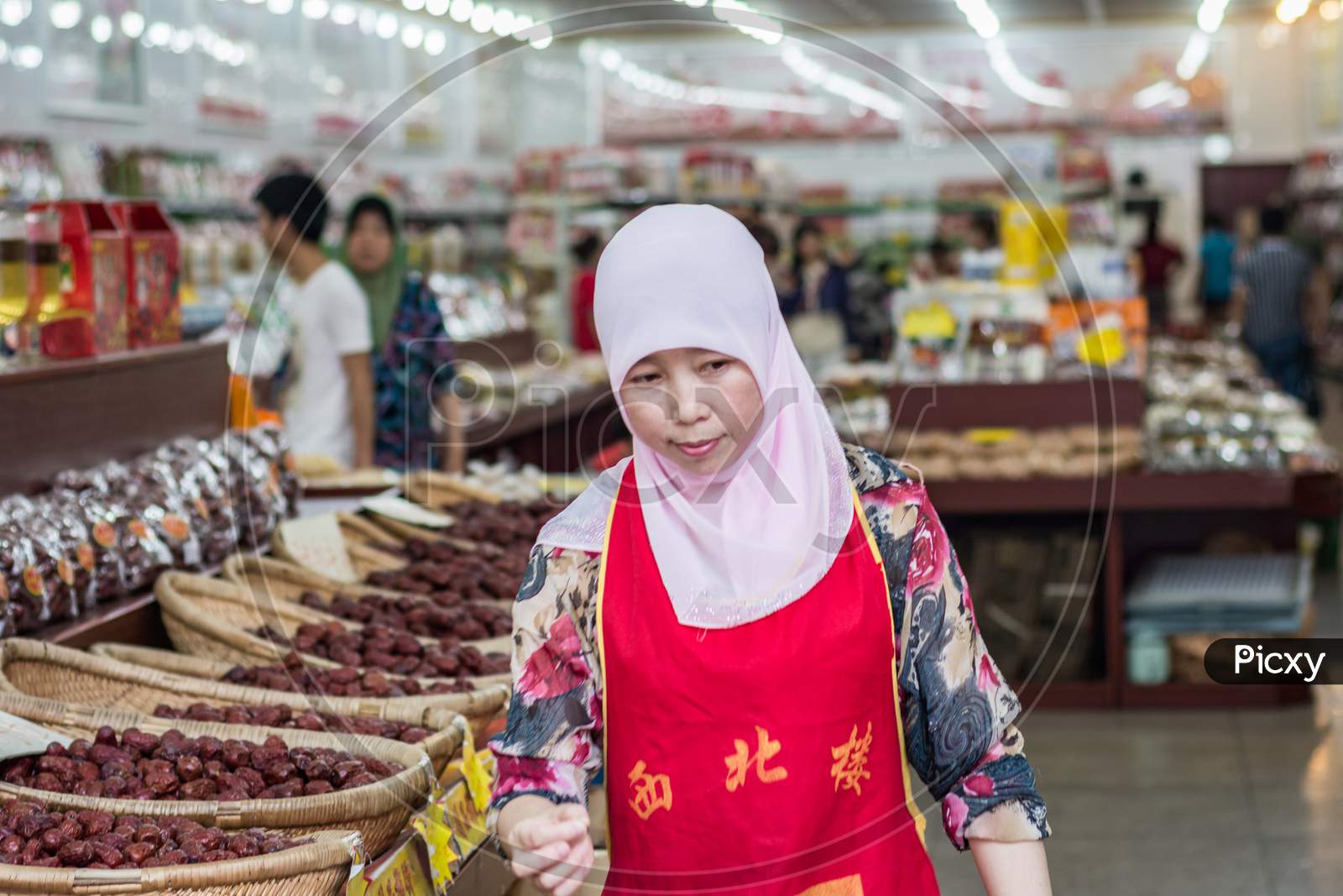 Young Chinese Hui Muslim Woman In Xian Muslim Quarter, China