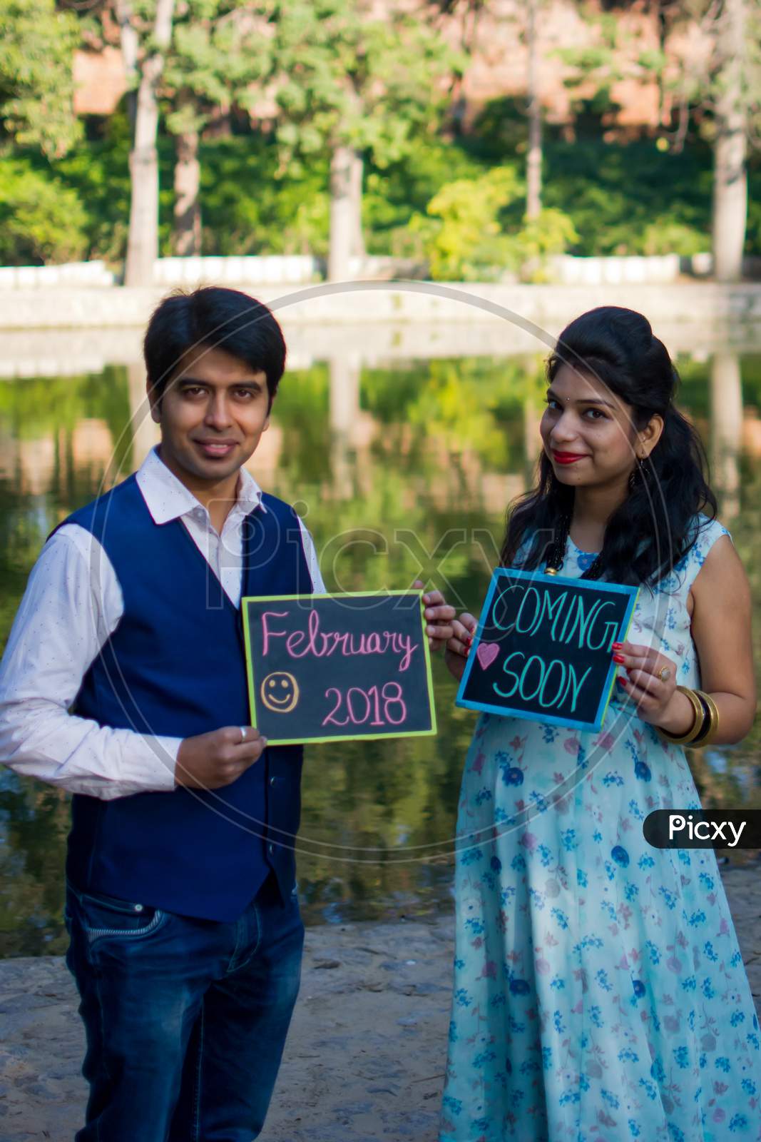 New Delhi India – March 13 2020 : Maternity Shoot Pose For Welcoming New Born Baby In Lodhi Road In Delhi India, Maternity Photo Shoot Done By Parents For Welcoming Their Child