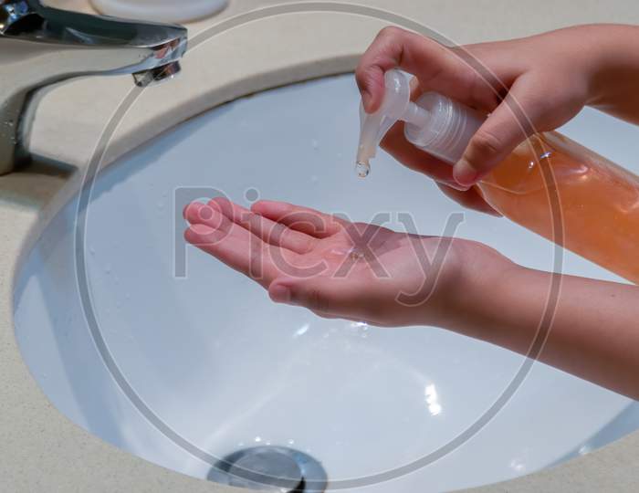 Close-Up Of Soap Being Pumped Out