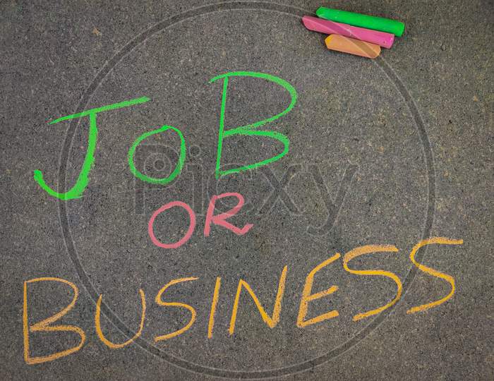 The Inscription Text On The Grey Board, Job Or Business. Using Color Chalk Pieces.
