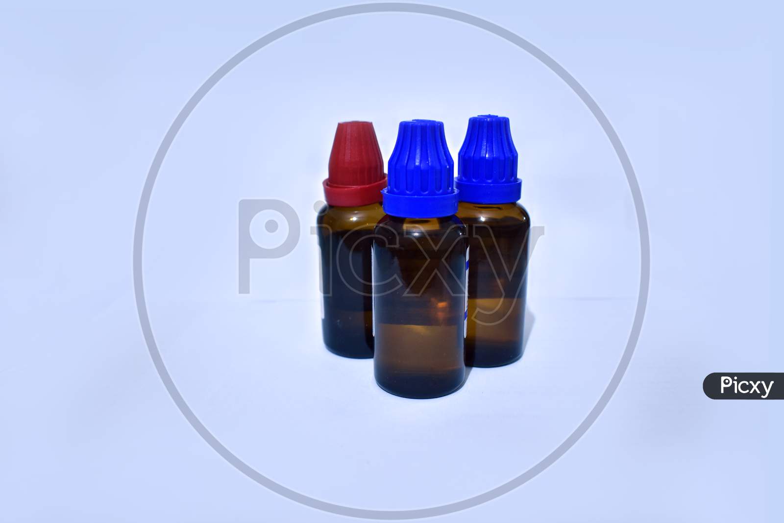 Homeopathy medicine bottles with isolated background.