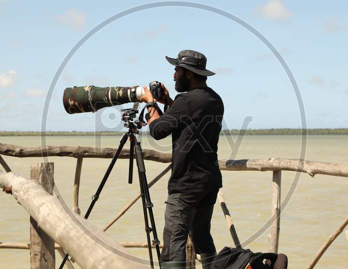 Travel Photographer in the work