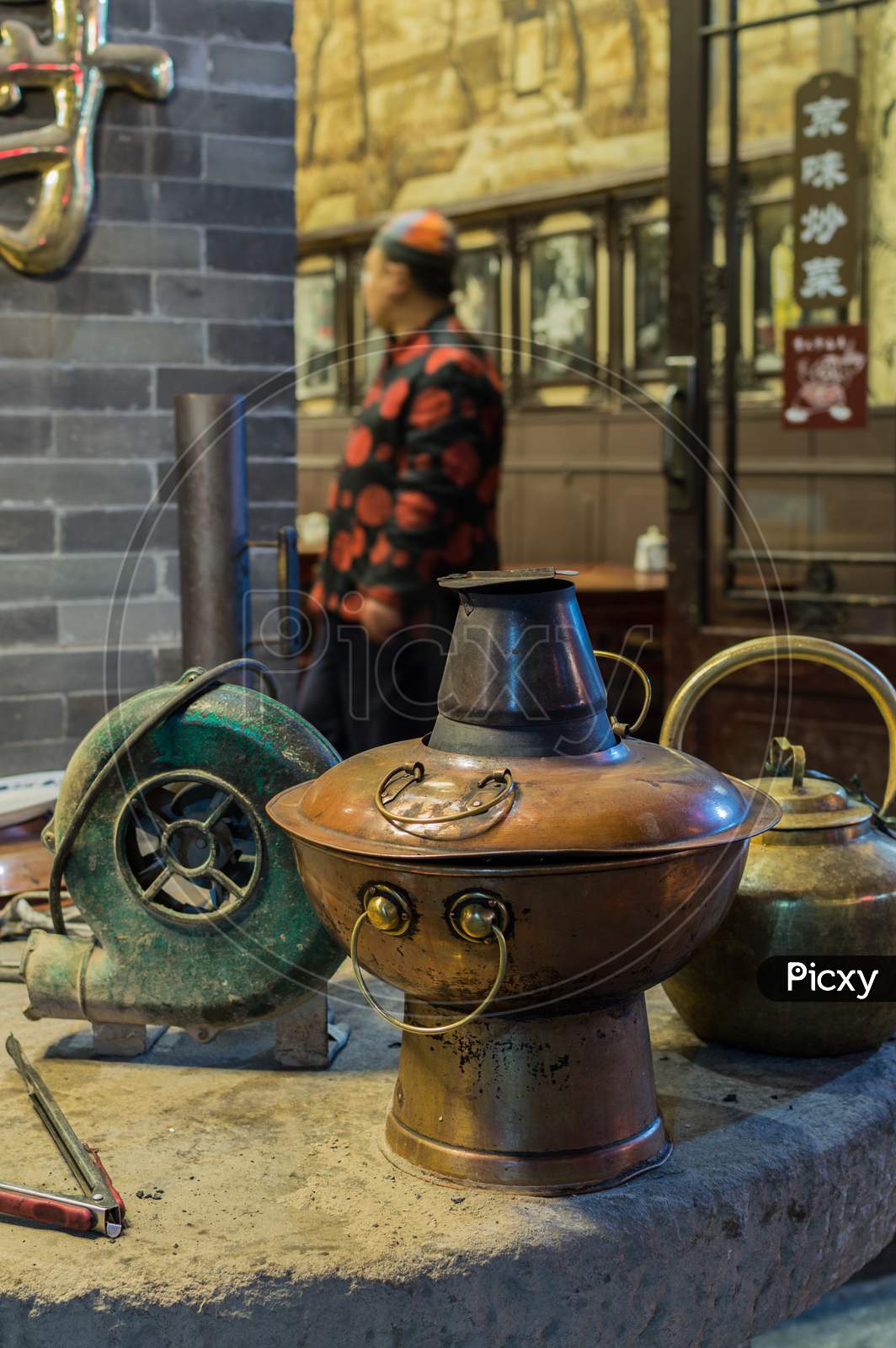 Hot Pot In Front Of The Restaurant In Old Qianmen Street In Beijing, China